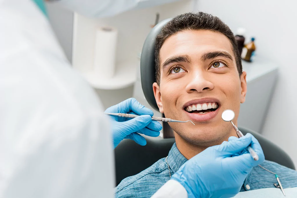 Veteran smiling after dental care in Yuma
