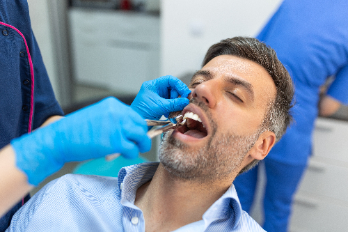 patient having a tooth pulled in Yuma